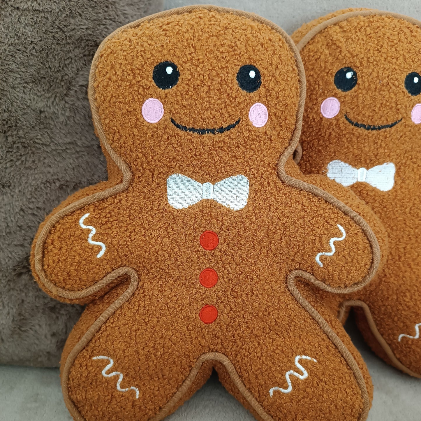 Coussin bouclette bonhomme en pain d'épices Something Different Wholesale