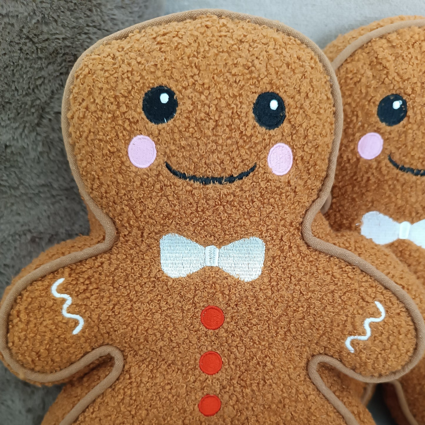 Coussin bouclette bonhomme en pain d'épices Something Different Wholesale